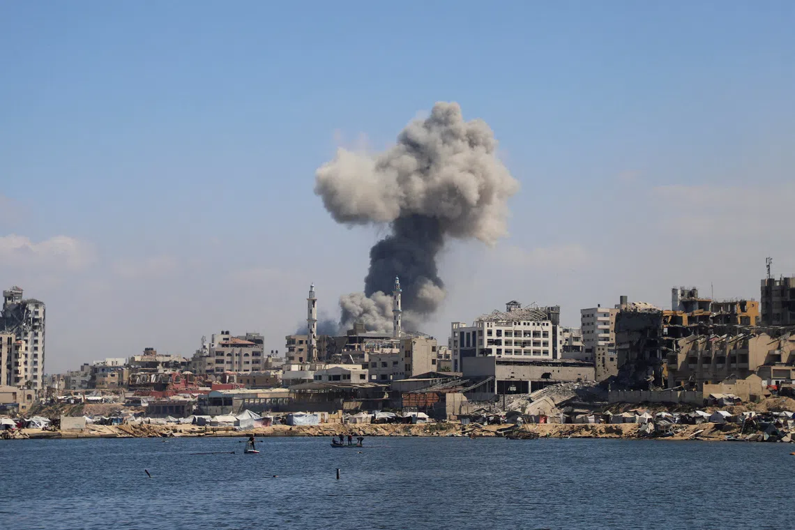 Smoke rising in Gaza City following Israeli strikes on Sept 18.