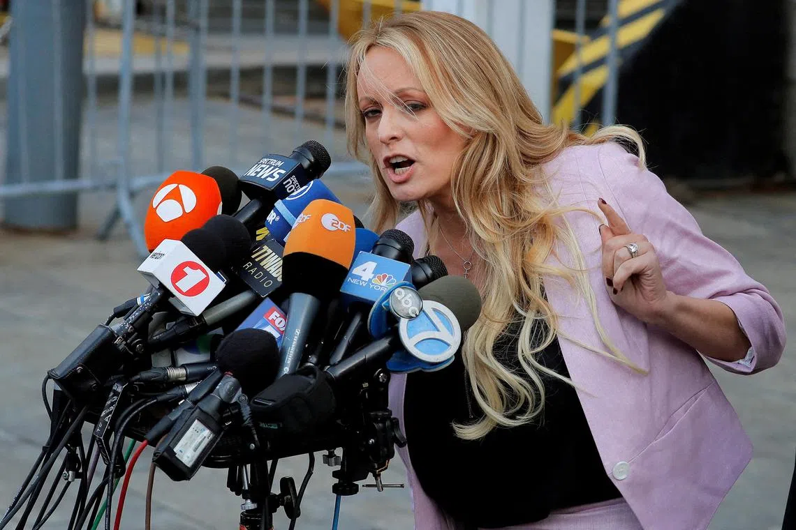 FILE PHOTO: Adult-film actress Stephanie Clifford, also known as Stormy Daniels, speaks as she departs federal court in the Manhattan borough of New York City, New York, U.S., April 16, 2018. REUTERSLucas Jackson/File Photo