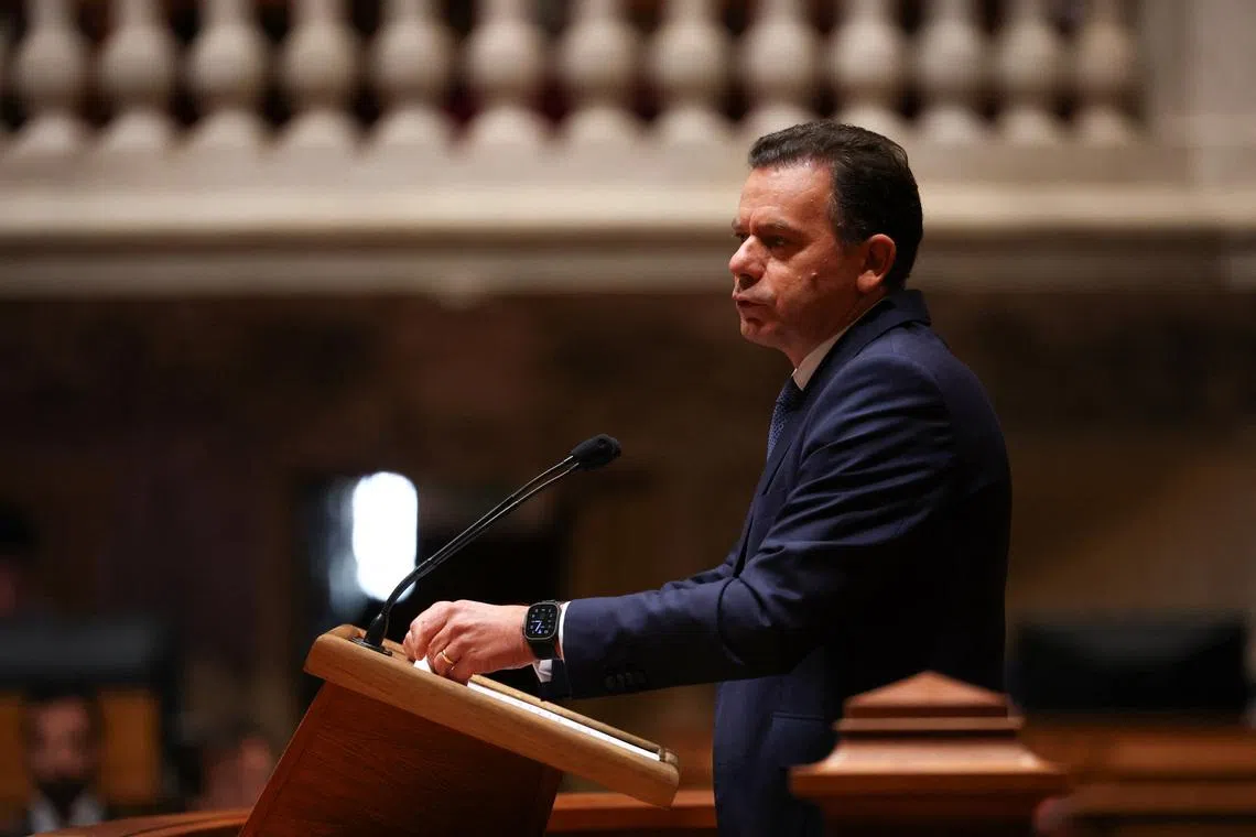 Portugal's Prime Minister Luis Montenegro speaks during the debate on government's performance on the storms that hit Portugal, at the parliament in Lisbon, Portugal, February 19, 2026. REUTERS/Pedro Nunes