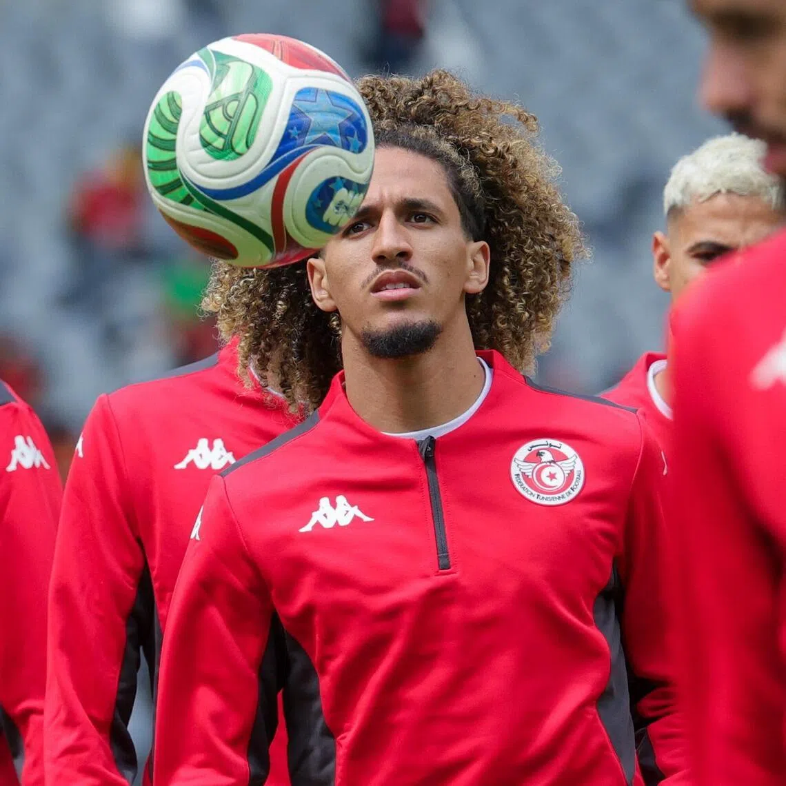 Hannibal Mejbri, seen here warming up ahead of a friendly against Belgium on June 6, is bringing the fight to the 2026 World Cup. 