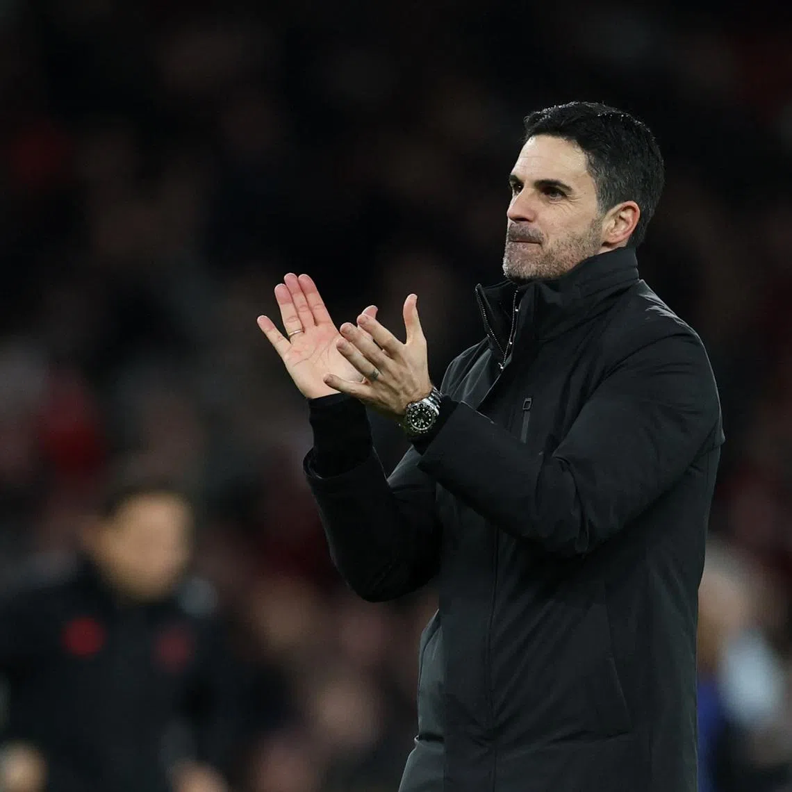 Soccer Football - UEFA Champions League - Round 16 - Second Leg - Arsenal v Bayer Leverkusen - Emirates Stadium, London, Britain - March 17, 2026 Arsenal manager Mikel Arteta applauds fans after the match Action Images via Reuters/Andrew Boyers