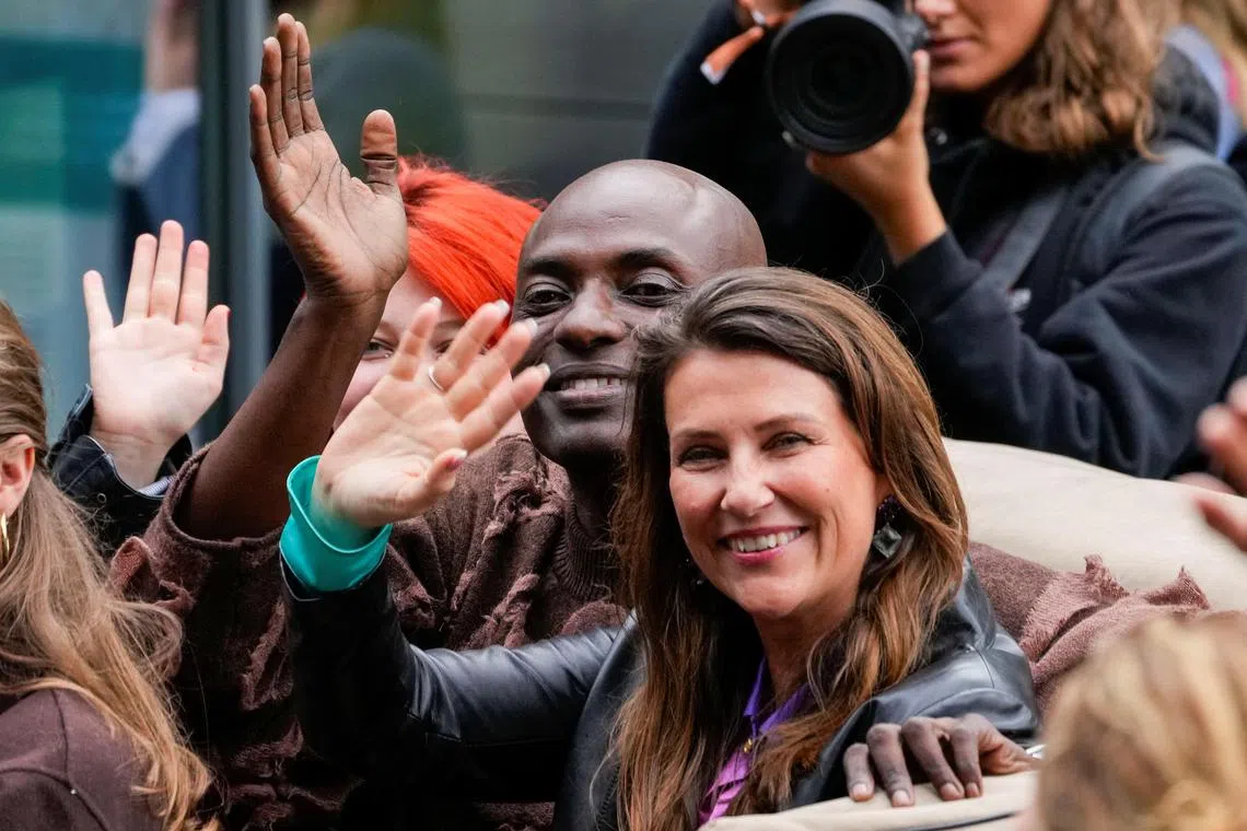 Norway's Princess Martha Louise and Mr Durek Verrett wave as they attend their wedding celebrations in Geiranger, Norway on Aug 30, 2024. 