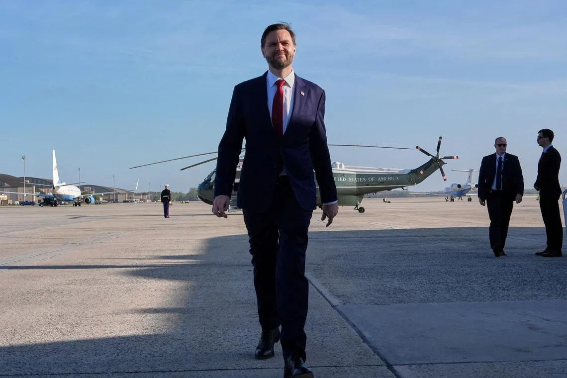 FILE PHOTO: U.S. Vice President JD Vance walks to speak to the media before boarding Air Force Two for expected departure to Pakistan for talks on Iran, at Joint Base Andrews, Maryland, U.S., April 10, 2026. Jacquelyn Martin/Pool via REUTERS/File Photo