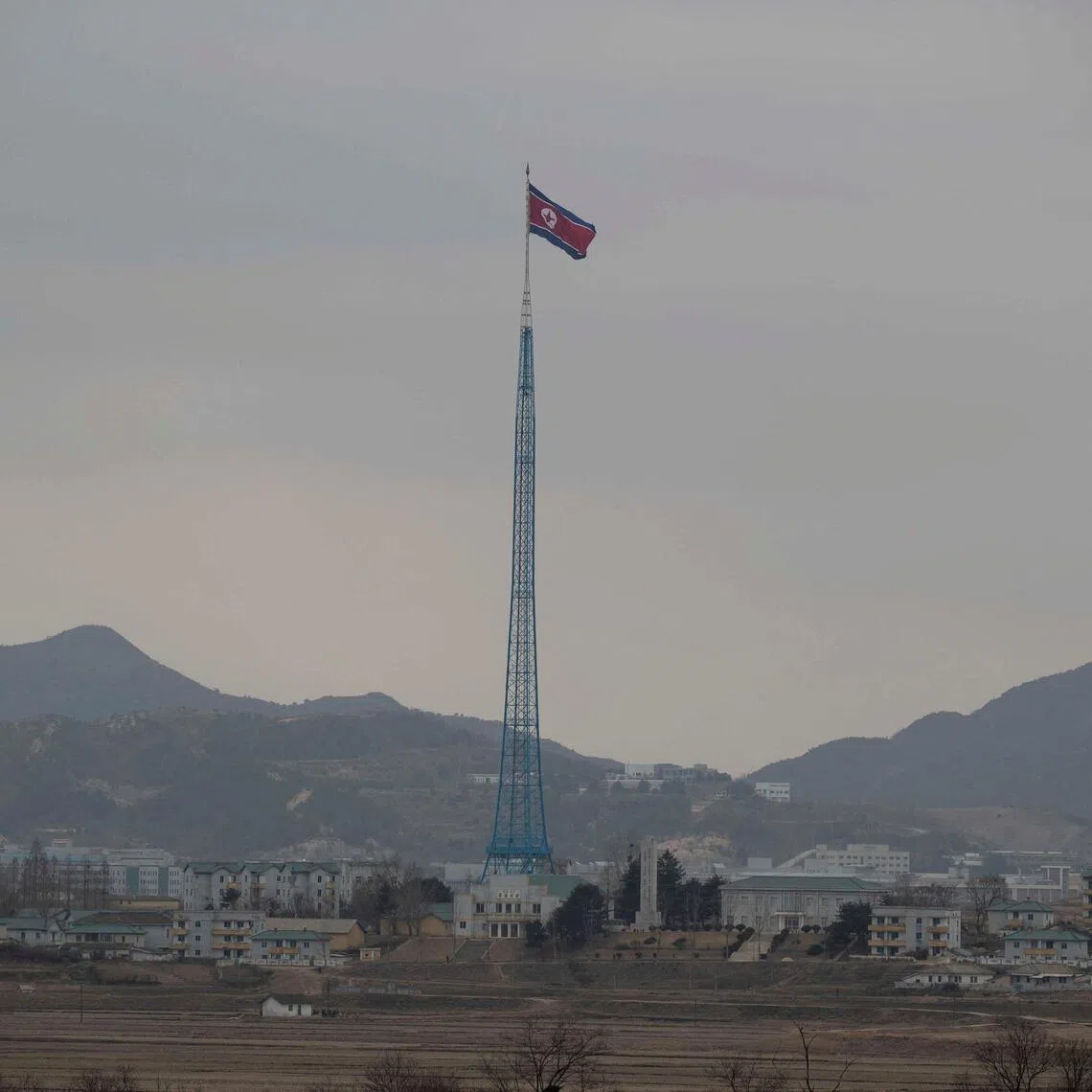 North Korean propaganda village "Gijungdong" is seen from an South Korea's observation post inside the JSA during a media tour at the Joint Security Area (JSA) on the Demilitarized Zone (DMZ) in the border village of Panmunjom in Paju, South Korea.