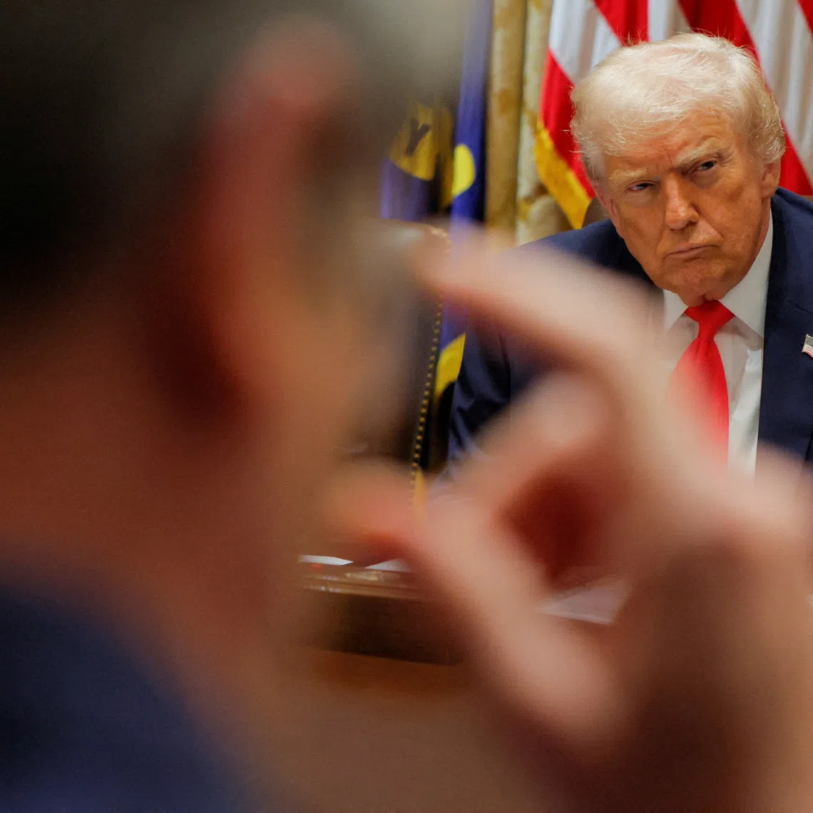 U.S. President Donald Trump attends a cabinet meeting at the White House in Washington, D.C., U.S., December 2, 2025. REUTERS/Brian Snyder