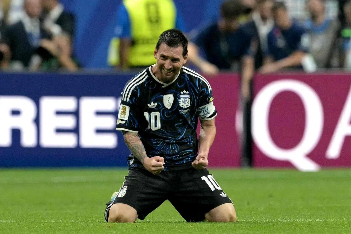 Lionel Messi celebrates after Argentina beat England to reach the World Cup final.