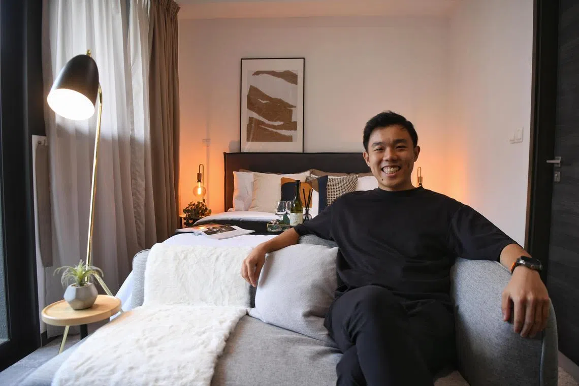 Ad agency founder Lenney Leong grew up in a three-room HDB flat, but he now owns a studio apartment bought with his earnings. ST PHOTO: AZMI ATHNI