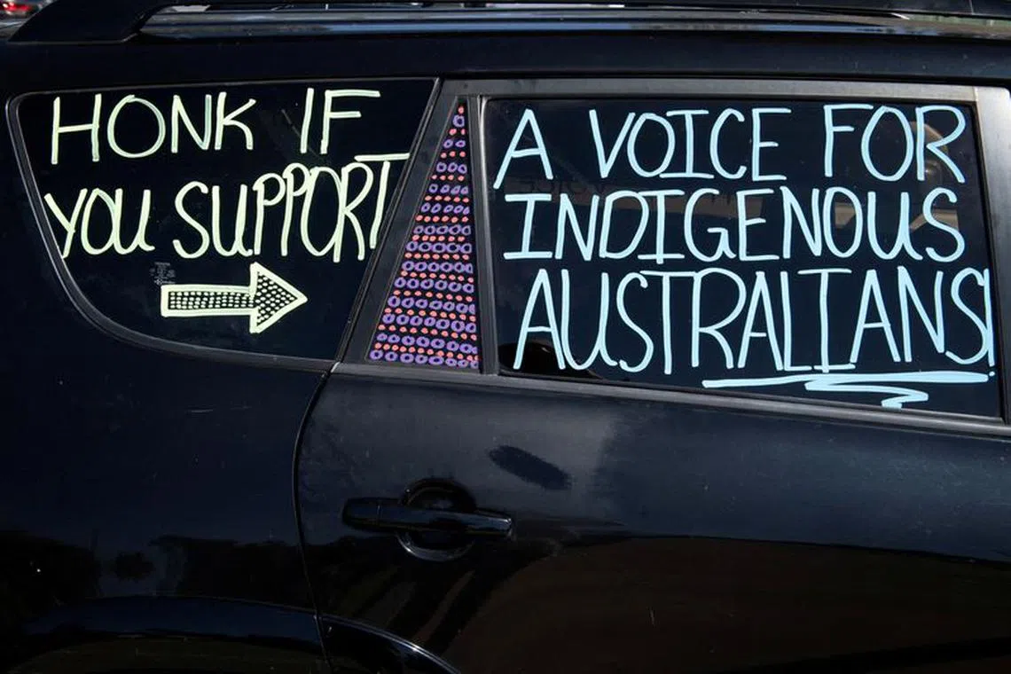 FILE PHOTO: Writing on a car displays support for the 'Yes' vote in Australia's upcoming referendum on Indigenous issues, at a car park in Alice Springs, Australia, September 17, 2023.  REUTERS/Jaimi Joy/File Photo