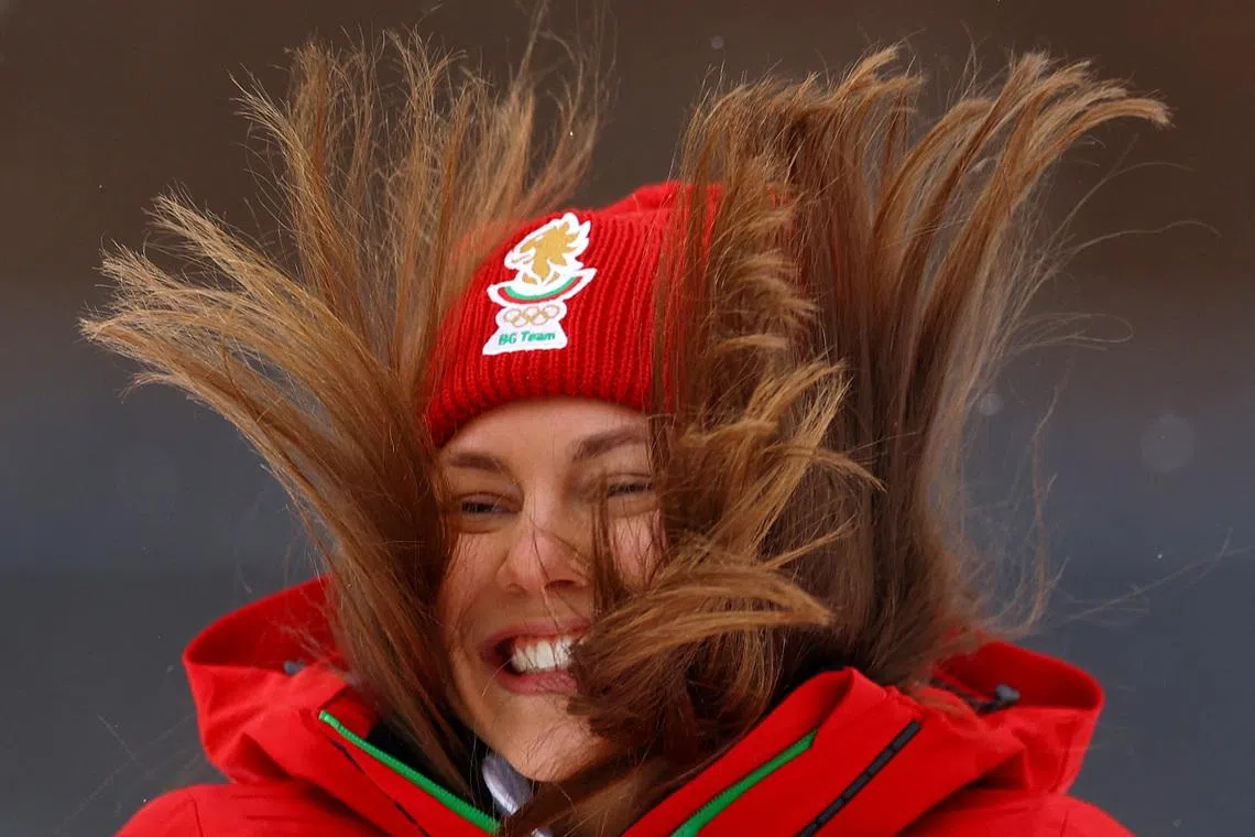 Milano Cortina 2026 Olympics - Biathlon - Women's 15km Individual Victory Ceremony - Anterselva Biathlon Arena, South Tyrol, Italy - February 11, 2026.  Bronze medallist Lora Hristova of Bulgaria celebrates on the podium during the victory ceremony REUTERS/Matthew Childs