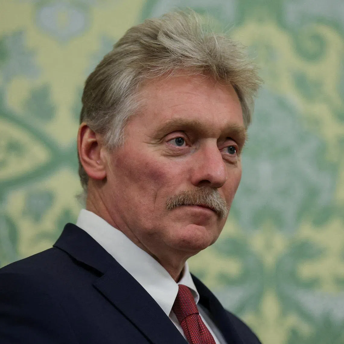 FILE PHOTO: Kremlin spokesman Dmitry Peskov looks on as Russia's President Vladimir Putin (not pictured) and Togo's President of the Council of Ministers Faure Gnassingbe (not pictured) meet at the Kremlin in Moscow, Russia November 19, 2025. REUTERS/Ramil Sitdikov/Pool/File Photo