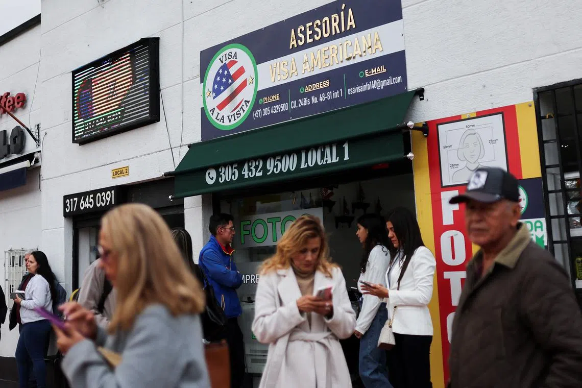 People who had an appointment scheduled for the visa process to the United States and were cancelled, wait outside the United States embassy for some rescheduling information, in Bogota, Colombia January 27, 2025. REUTERS/Luisa Gonzalez