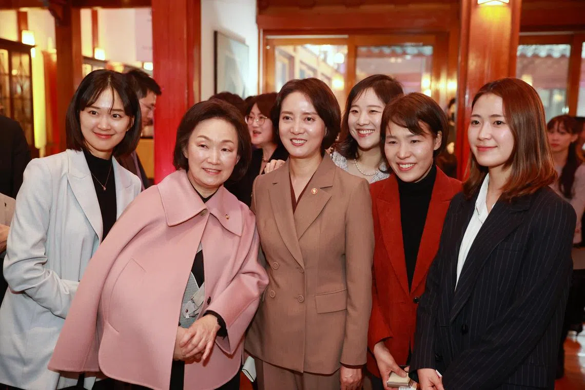 South Korea's Ministry of SMEs and Startups Lee Young (centre) posing with a group of women who founded their own startups, at a recent event to celebrate women in innovation.