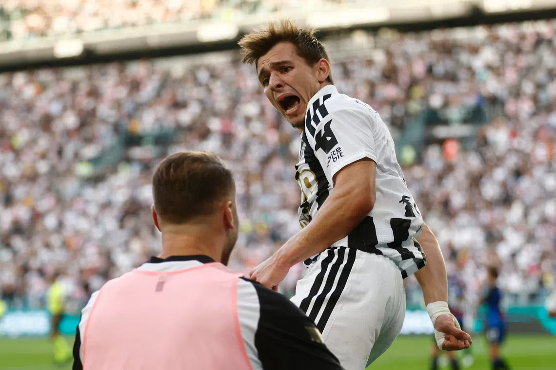 Juventus’ Francisco Conceicao celebrates scoring their first goal.