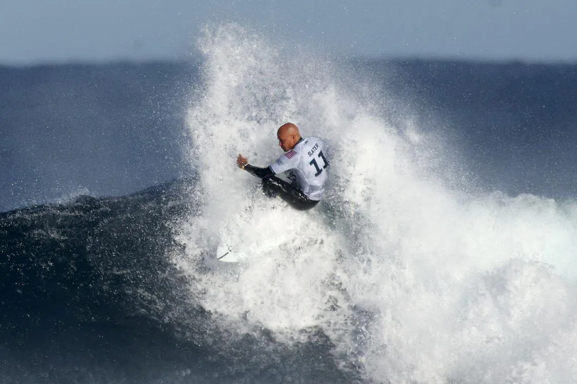 TOPSHOT - US surfer Kelly Slater competes during the Margaret River Pro surfing competition at Margaret River, in Perth Western Australia on April 16, 2024. (Photo by COLIN MURTY / AFP) / -- IMAGE RESTRICTED TO EDITORIAL USE - STRICTLY NO COMMERCIAL USE --