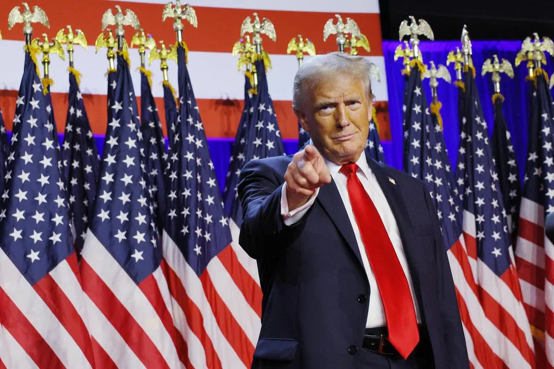 US President-elect Donald Trump addressing supporters as he claimed victory in the US presidential election at Palm Beach County Convention Centre in Florida on Nov 6, 2024. He delivered his speech after winning the key swing states of Pennsylvania, North Carolina and Georgia, while streaking ahead of his Democratic rival, Vice-President Kamala Harris, in Wisconsin and Michigan.
