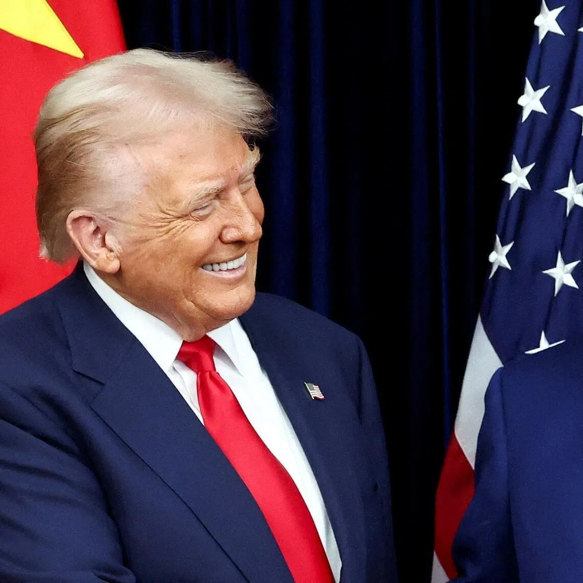 US President Donald Trump (left) stressed that he has a “good relationship with China” and “looks forward” to seeing Chinese president Xi Jinping.