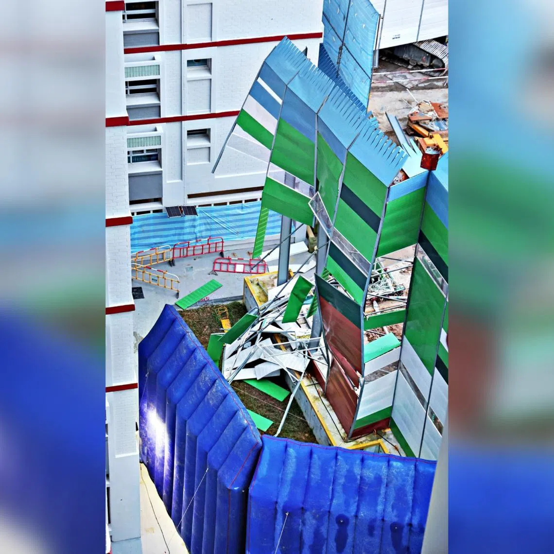 Damaged panels were seen in a pile on the ground, at the construction site of an MRT station in Pasir Ris.
