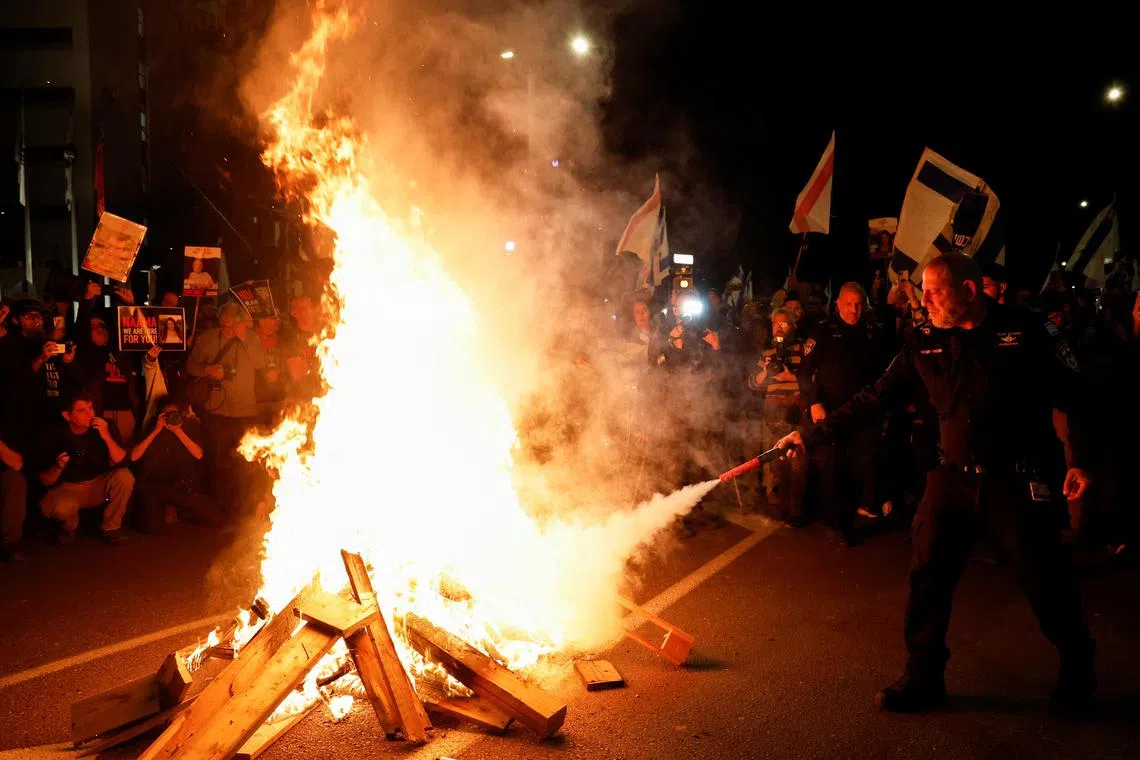 A protest in Tel Aviv against Israel Prime Minister Benjamin Netanyahu, who is facing increasing pressure to negotiate a cease-fire but vowed to invade Rafah, where a million Palestinians are seeking shelter.