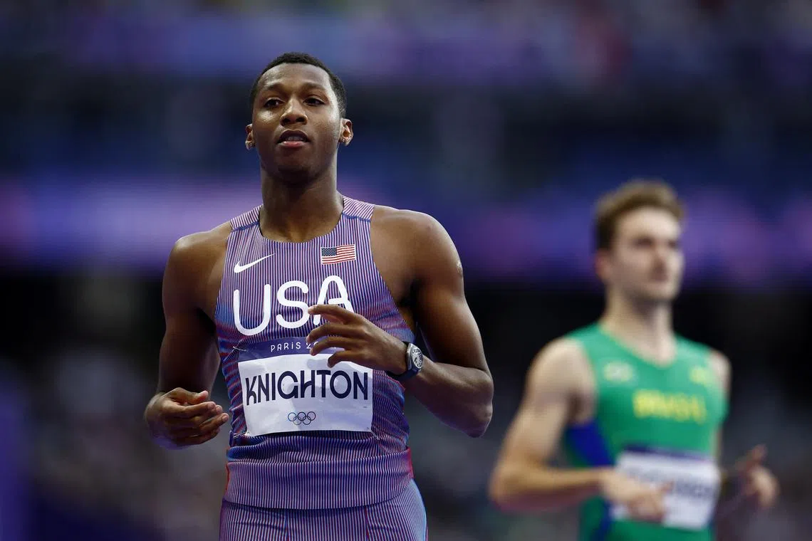 FILE PHOTO: Paris 2024 Olympics - Athletics - Men's 200m Semi-Finals - Stade de France, Saint-Denis, France - August 07, 2024. Erriyon Knighton of United States reacts after winning semi final 3. REUTERS/Sarah Meyssonnier/ File Photo