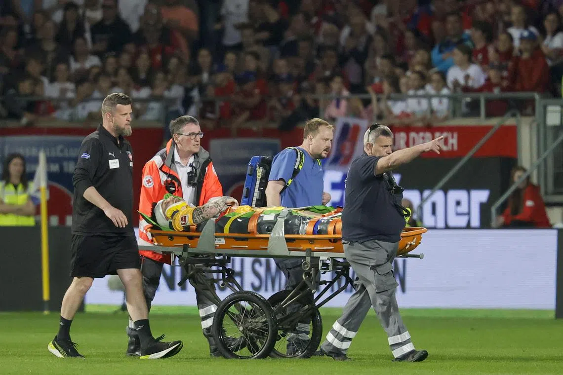Heidenheim goalkeeper Kevin Muller is stretchered off the pitch during the German Bundesliga soccer match against VfL Bochum, in Heidenheim on May 2, 2025.