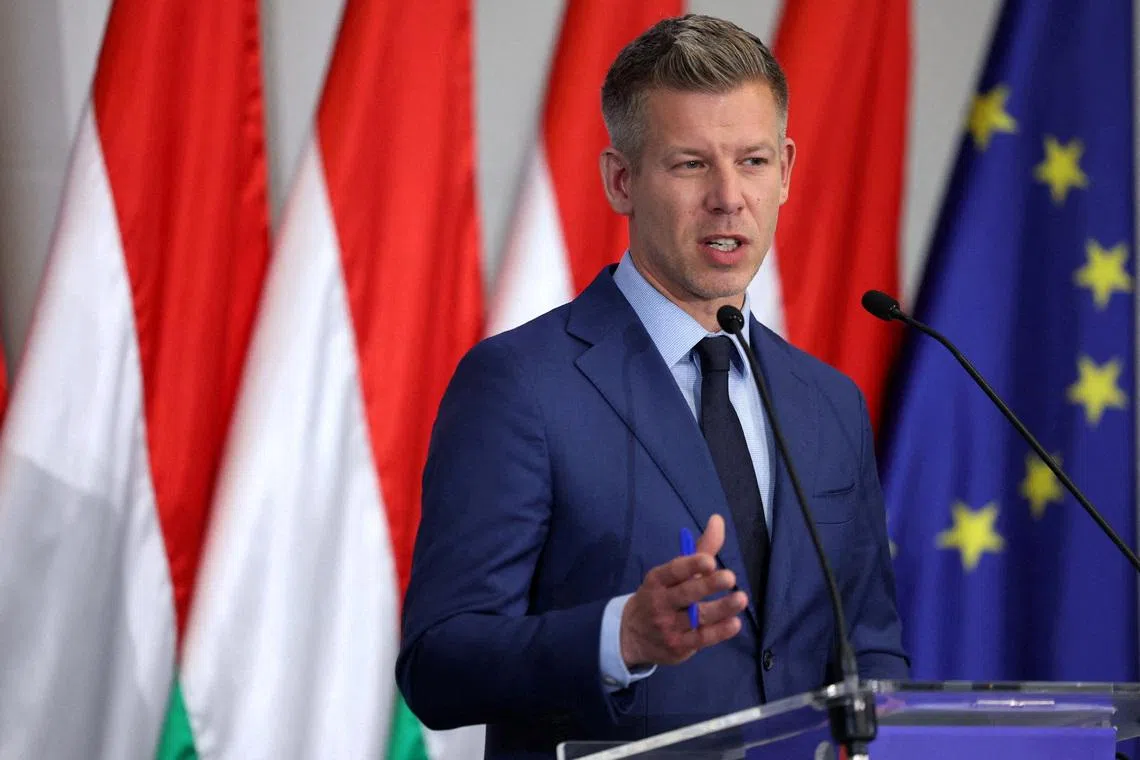 FILE PHOTO: Election winner Peter Magyar speaks during a press conference in Budapest, Hungary, April 20, 2026. REUTERS/Bernadett Szabo/File Photo