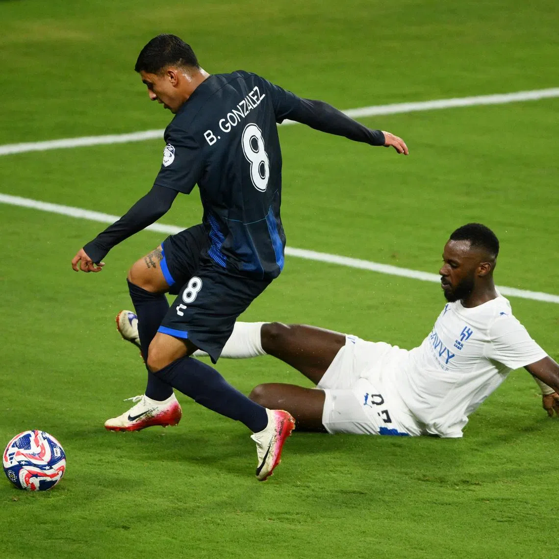 Soccer Football - FIFA Club World Cup - Group H - Al Hilal v Pachuca - Geodis Park, Nashville, Tennessee, U.S. - June 26, 2025 Al Hilal's Hassan Al Tambakti in action with Pachuca's Bryan Gonzalez IMAGN IMAGES via Reuters/Steve Roberts