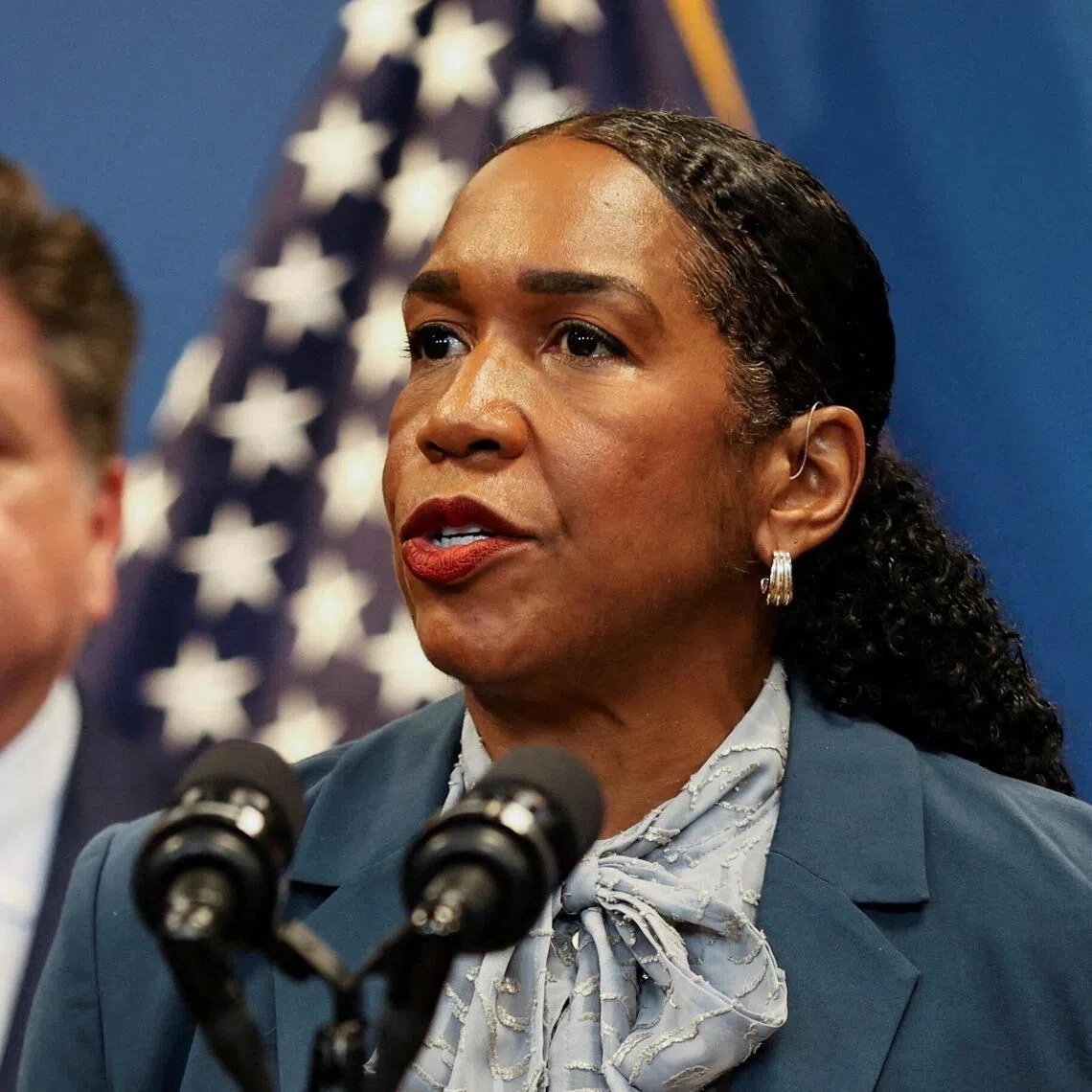 Illinois Lieutenant Governor Juliana Stratton was endorsed by Illinois Governor J.B. Pritzker (left) and was viewed as the most progressive of the top three candidates.