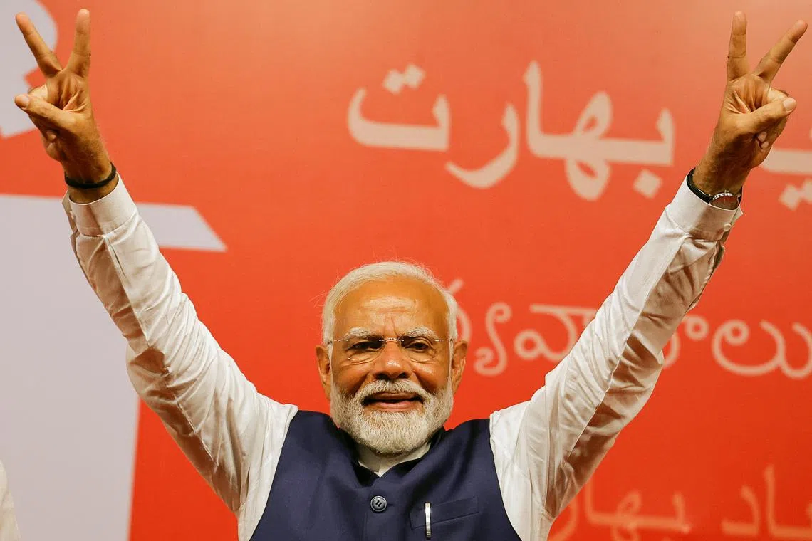 FILE PHOTO: Indian Prime Minister Narendra Modi gestures, at the Bharatiya Janata Party (BJP) headquarters in New Delhi, India, June 4, 2024. REUTERS/Adnan Abidi/File Photo