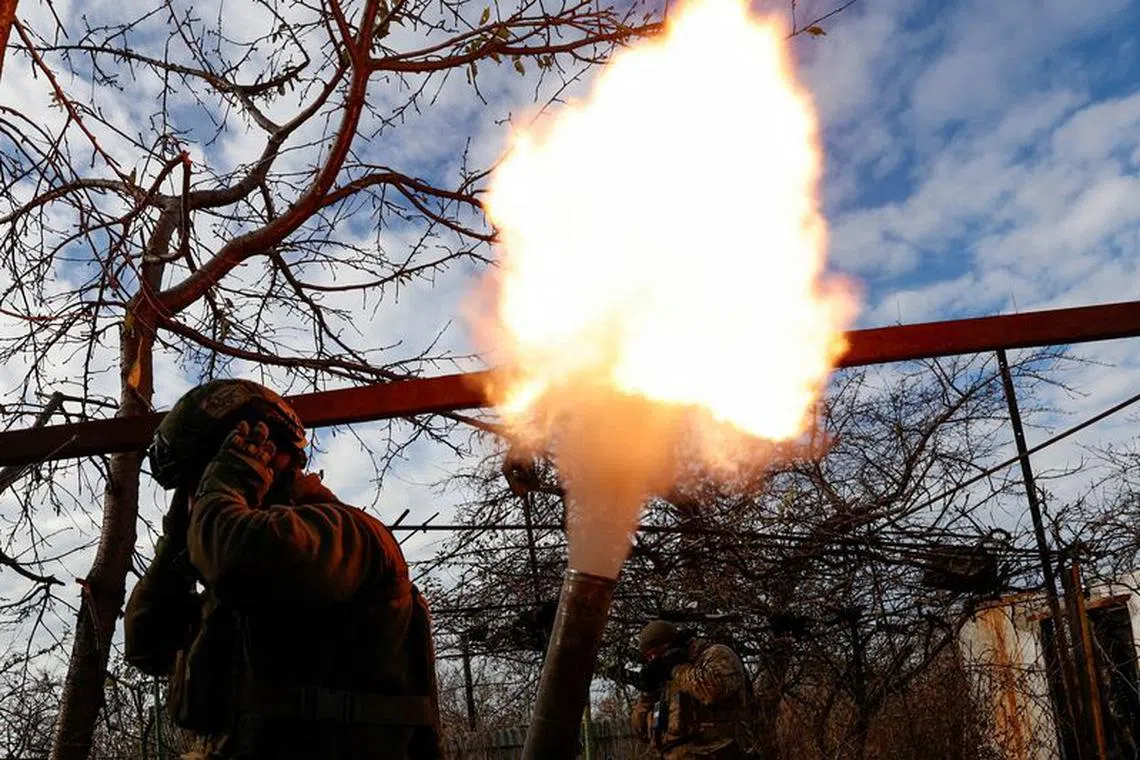 FILE PHOTO: Members of Ukraine's National Guard Omega Special Purpose unit fire a mortar toward Russian troops in the front line town of Avdiivka, amid Russia's attack on Ukraine, in Donetsk region, Ukraine November 8, 2023. Radio Free Europe/Radio Liberty/Serhii Nuzhnenko via REUTERS/File Photo
