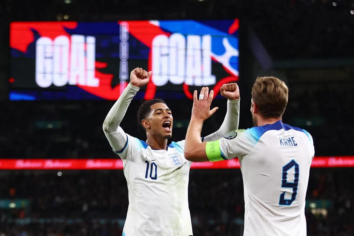 England captain Harry Kane celebrating with Jude Bellingham after scoring their third goal.
