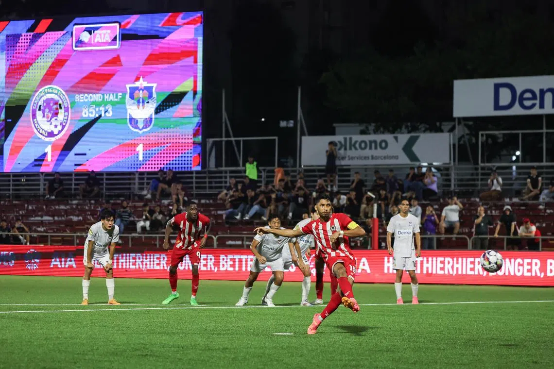 Faizal Roslan scoring his penalty to hand Tanjong Pagar a 2-1 lead. 