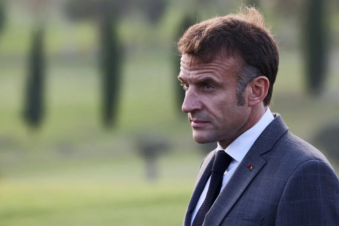 France's President Emmanuel Macron looks on after a family photo on the day of the Euro-Mediterranean Summit (EU-MED9) in a resort near Paphos, Cyprus, October 11, 2024. REUTERS/Yiannis Kourtoglou