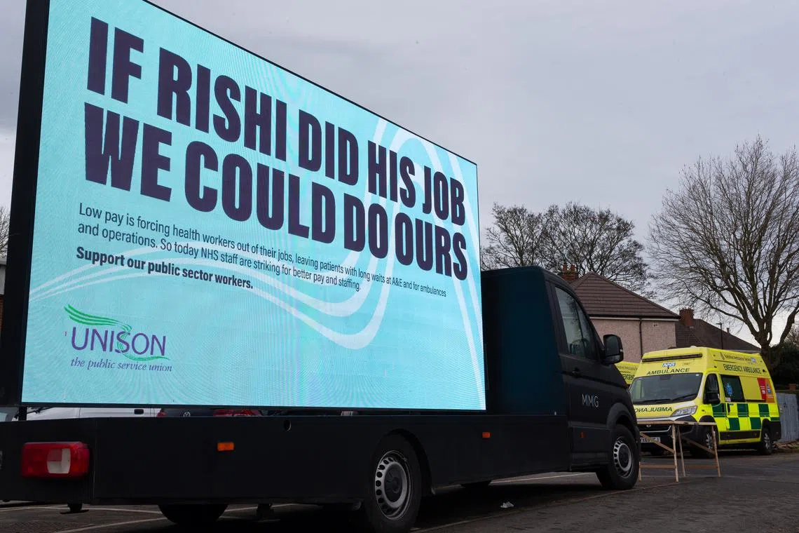 A billboard in support of NHS strikes is seen outside Longley Ambulance Station in Sheffield, Britain, on Feb 10, 2023.