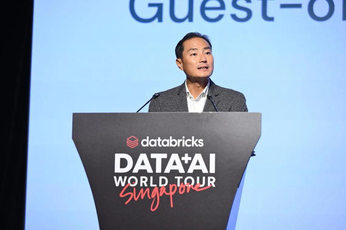 Senior Minister of State for Digital Development and Information Tan Kiat How speaking at Databrick’s Data + Al World Tour Singapore on Aug 30.