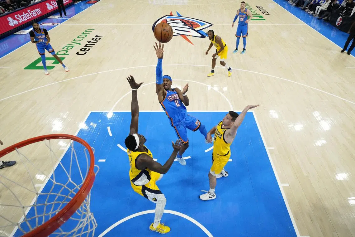 Oklahoma City Thunder guard Shai Gilgeous-Alexander (No. 2) shooting against the Indiana Pacers during Game 2 of the 2025 NBA Finals at Paycom Centre on June 8.