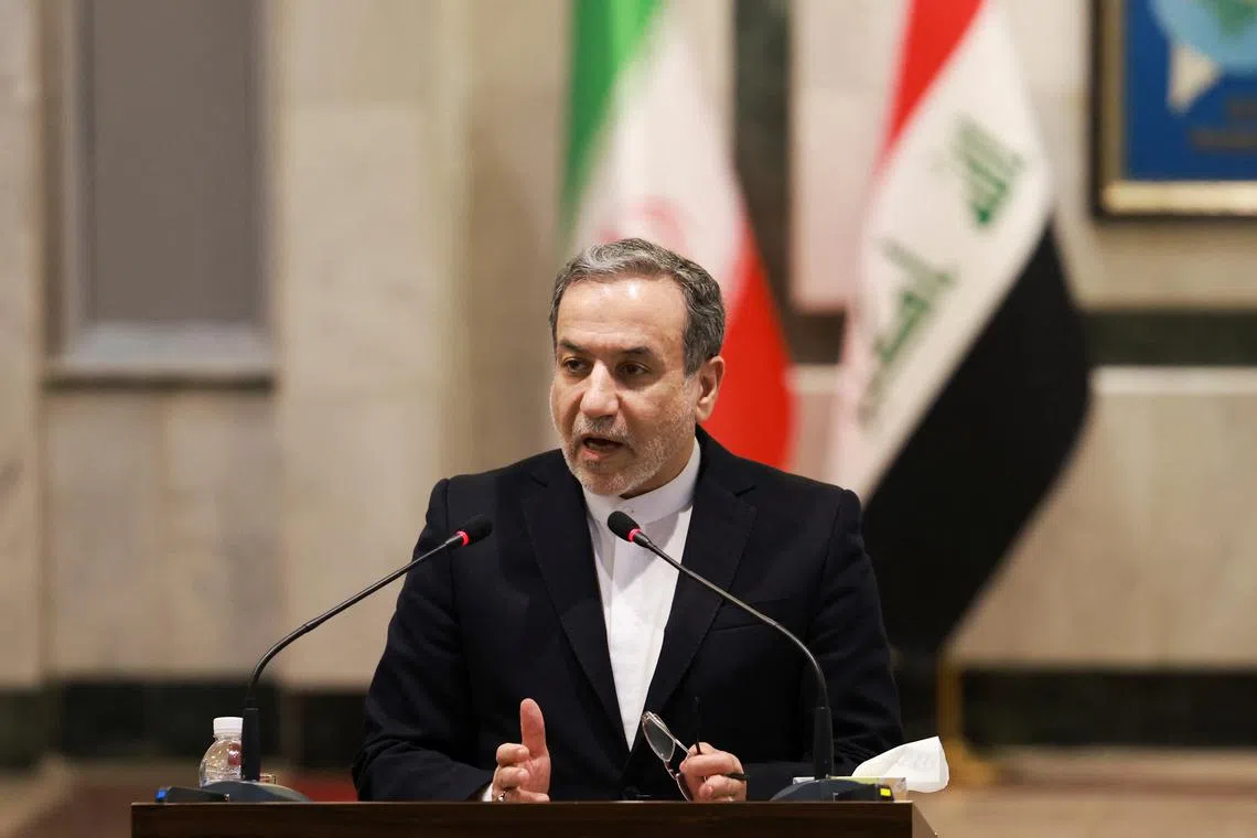 FILE PHOTO: Iran's Foreign Minister Abbas Araqchi speaks as he meets with his Iraqi counterpart Fuad Hussein, in Baghdad, Iraq October 13, 2024. REUTERS/Ahmed Saad/File Photo