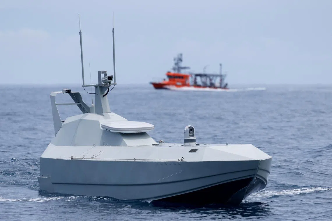A SeaShark 800 sea drone, developed by Thunder Tiger, takes part in a test ride in the sea off Wushi, Taiwan June 6, 2025. REUTERS/Ann Wang
