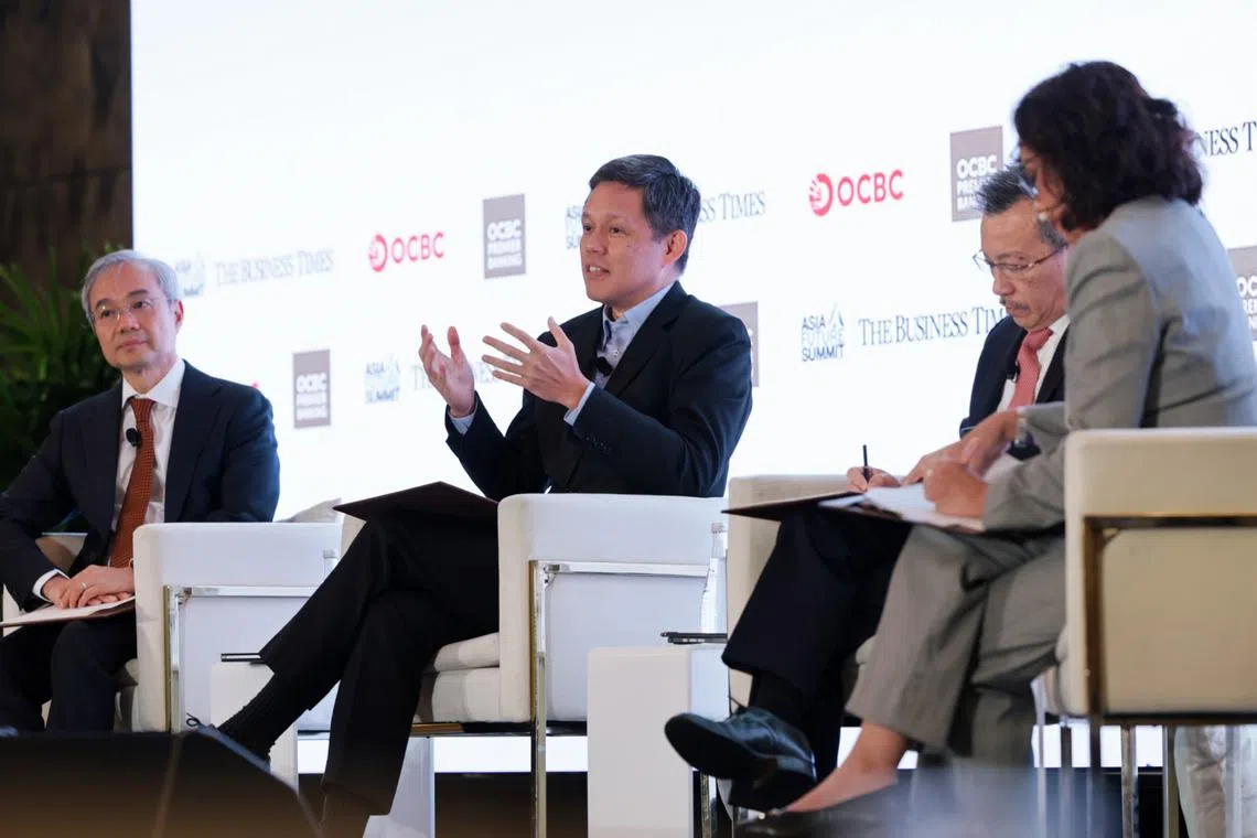 Education Minister Chan Chun Sing (centre) said that AI developers here must be proficient in various AI models.