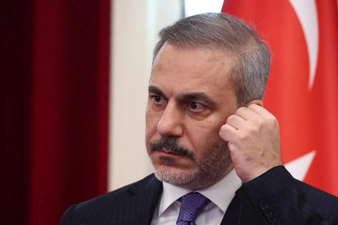 FILE PHOTO: Turkish Foreign Minister Hakan Fidan looks on during a press conference during an official visit in Tirana, Albania, January 29, 2024. REUTERS/Florion Goga/File Photo