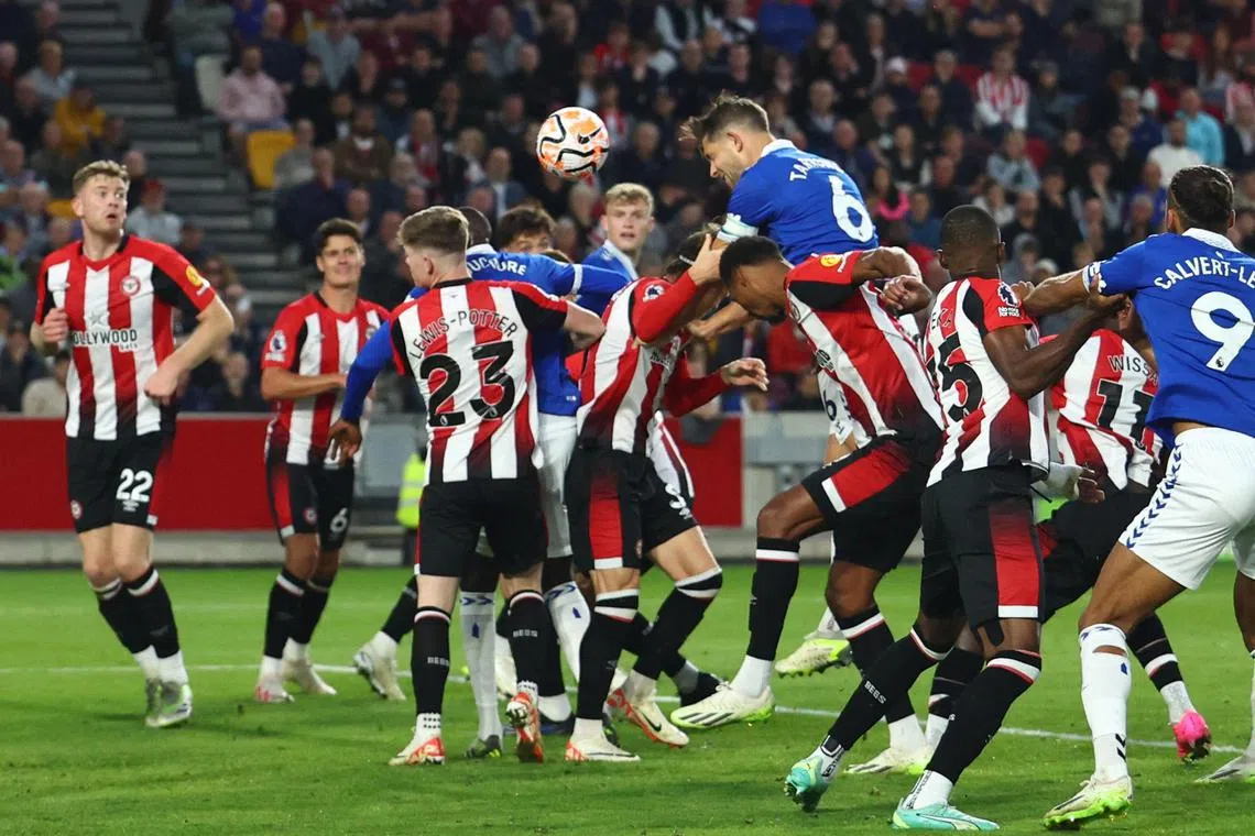 Everton's James Tarkowski scores their second goal.