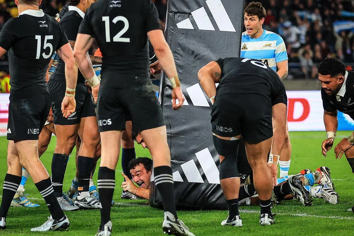 Argentina's Agustin Creevy celebrates scoring a try during the Rugby Championship match between New Zealand and Argentina at Sky Stadium in Wellington on Aug 10.