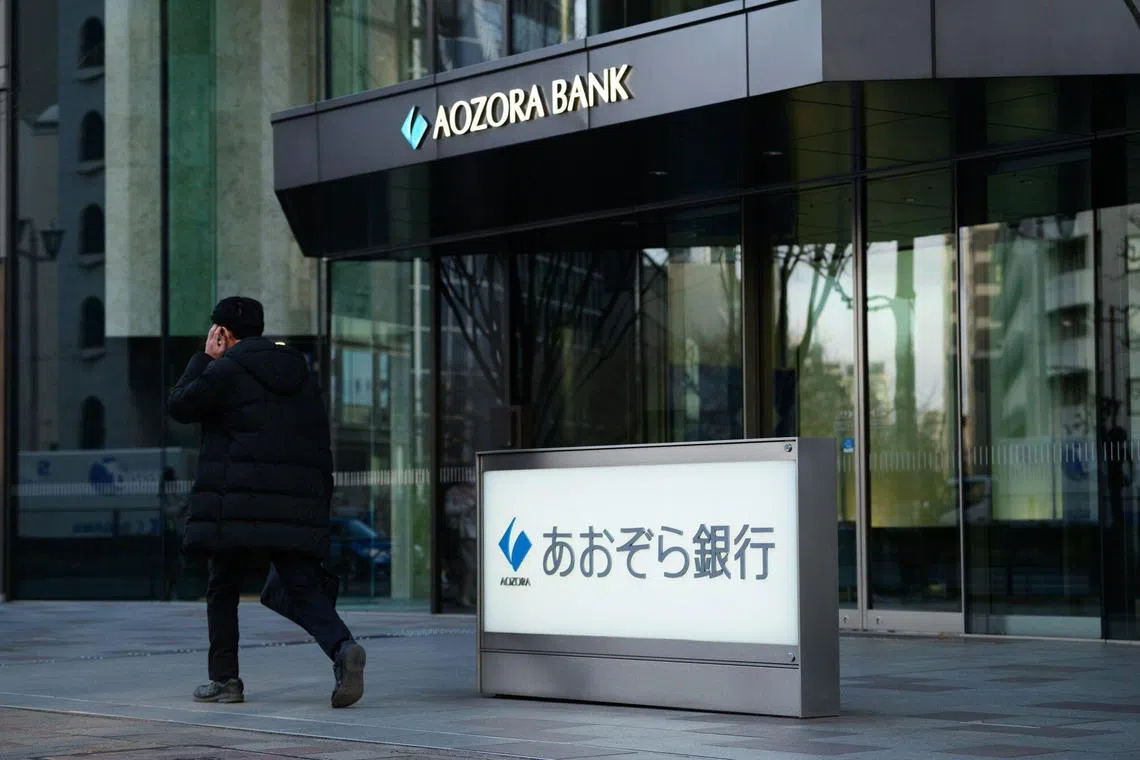 Aozora Bank said it would have its first loss in 15 years because of bad loans tied to US office property. 