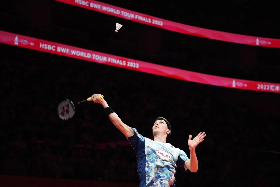 Denmark’s Viktor Axelsen hits a return to China’s Shi Yuqi during their men’s singles match at the BWF Badminton World Tour Finals in Hangzhou, in China’s eastern Zhejiang province on December 13, 2023. (Photo by AFP) / China OUT