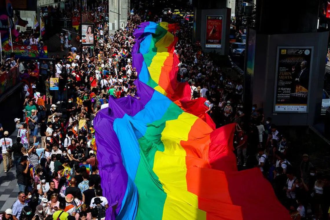 FILE PHOTO: People take part in the annual LGBTQ Pride parade in Bangkok, Thailand, June 4, 2023. REUTERS/Athit Perawongmetha/File Photo