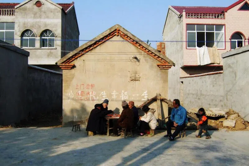 While two or three-storey houses are not uncommon in rural China today, Xiaogang is more neatly laid out and houses look a little more ornate than usual.