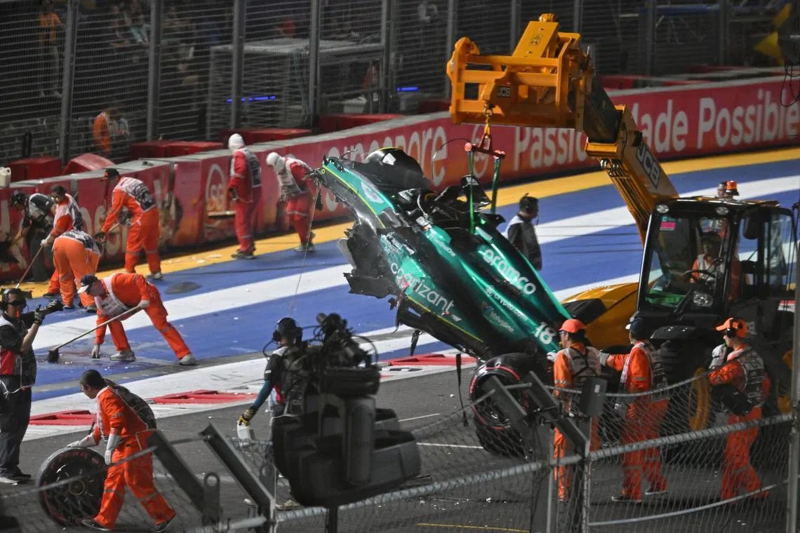 [NOTE: F1 photos are for editorial use only and NOT for sale] 
18 Lance Stroll of Aston Martin Aramco Cognizant F1 Team crashed near turn 19 during the qualifying session of the Formula One Singapore Airlines Singapore Grand Prix at Marina Bay street circuit on September 16, 2023.

/
Practice 3 and Qualifying session
of the Formula One Singapore Airlines Singapore Grand Prix at Marina Bay street circuit on
September 16, 2023.