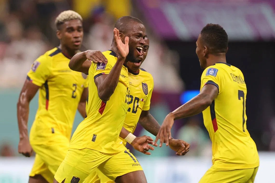 Enner Valencia of Ecuador (centre) celebrates scoring against Qatar in the opening game of the World Cup on Sunday. 