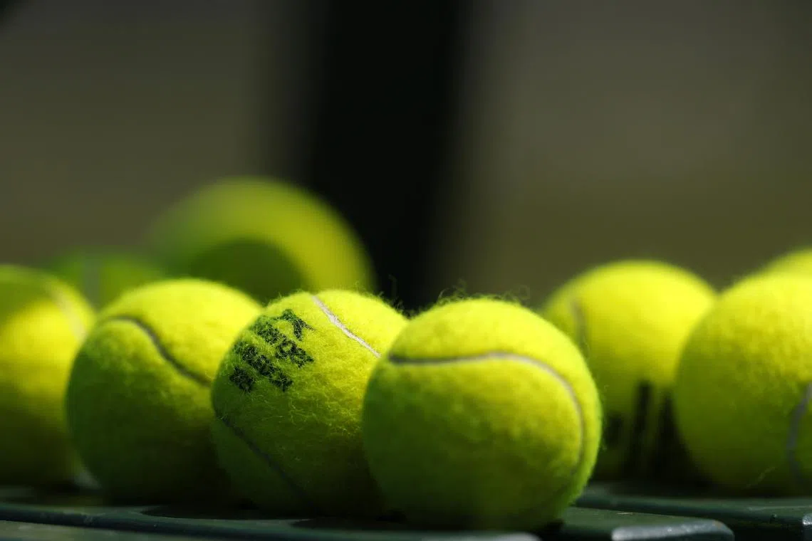 Tennis - Wimbledon - All England Lawn Tennis and Croquet Club, London, Britain - June 28, 2025 General view of tennis balls during Britain's Jack Draper's practice session REUTERS/Andrew Couldridge
