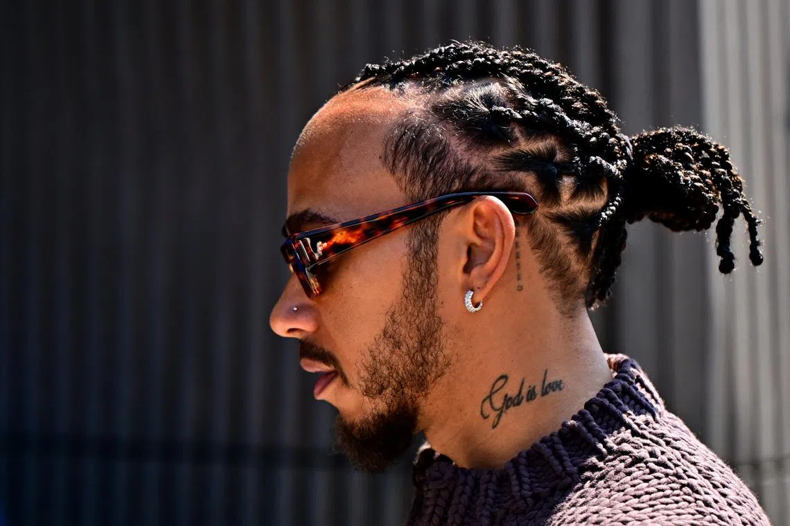 Formula One F1 - Hungarian Grand Prix - Hungaroring, Budapest, Hungary - July 18, 2024 Mercedes' Lewis Hamilton arrives before the Hungarian Grand Prix REUTERS/Marton Monus