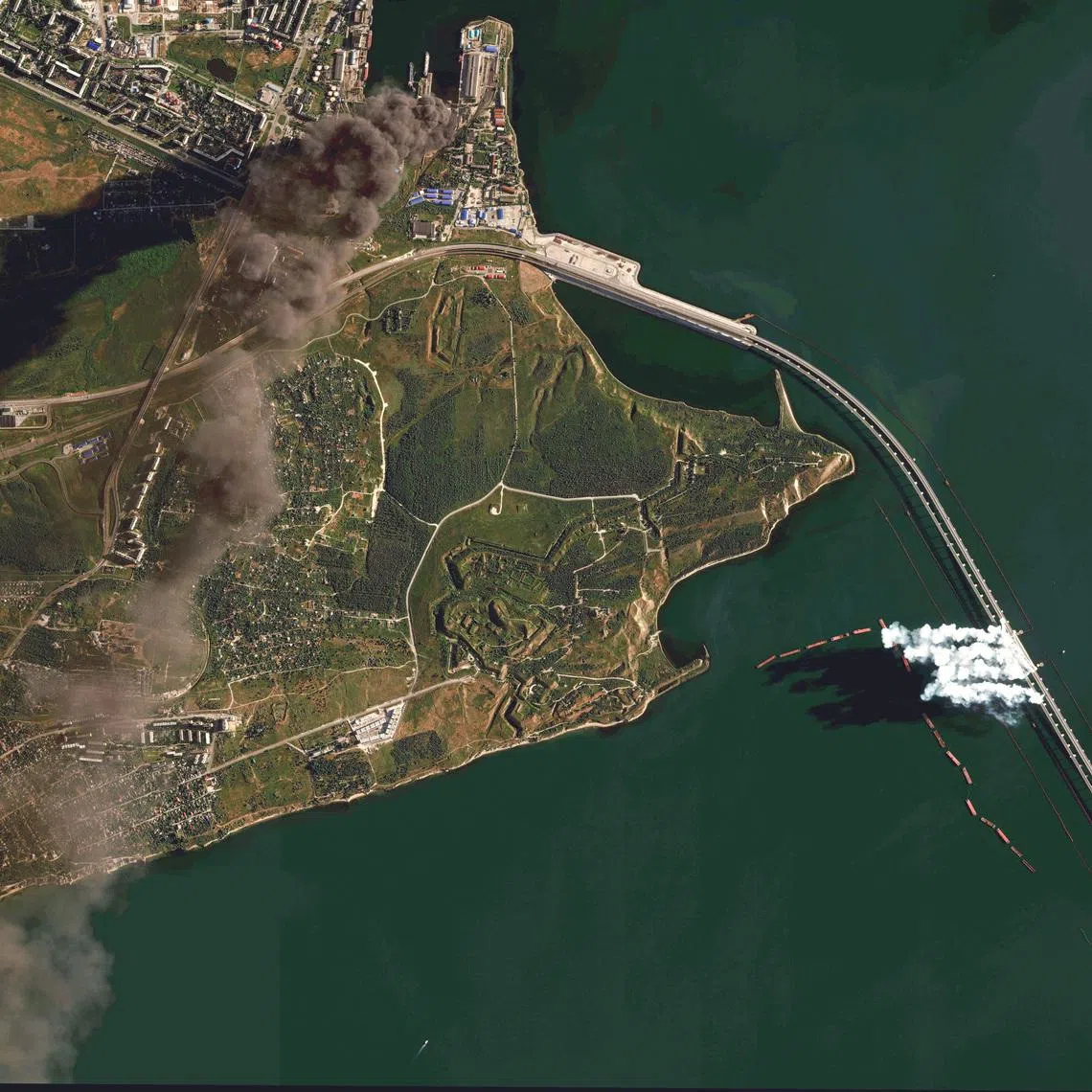 A satellite image shows burning oil storage tanks and smoke rising from the Crimea Bridge, amid Russia-Ukraine conflict, Crimea, June 22, 2026. Vantor/Handout via REUTERS